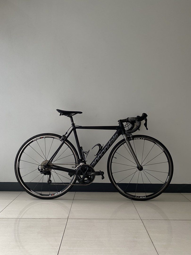 Cannondale CAAD12 (Category: Bicycles) located in Manila. Submitted by somebanothings2.0 (Listing ID 1470808178, Image 1). Description: Cannondale CAAD12 - Matte Black / Anthracite - size 48 XS (ideal for 5’2”-5’9”) - 8.24 kg overall build - in excellent condition, no issues - well taken care of, bihira gamitin Groupset: - Shimano 105 (STI, crankset, FD, RD, pedals) - Shimano Ultegra (brakes) - BB30a bottom bracket Wheelset: - Shimano RS11 wheels