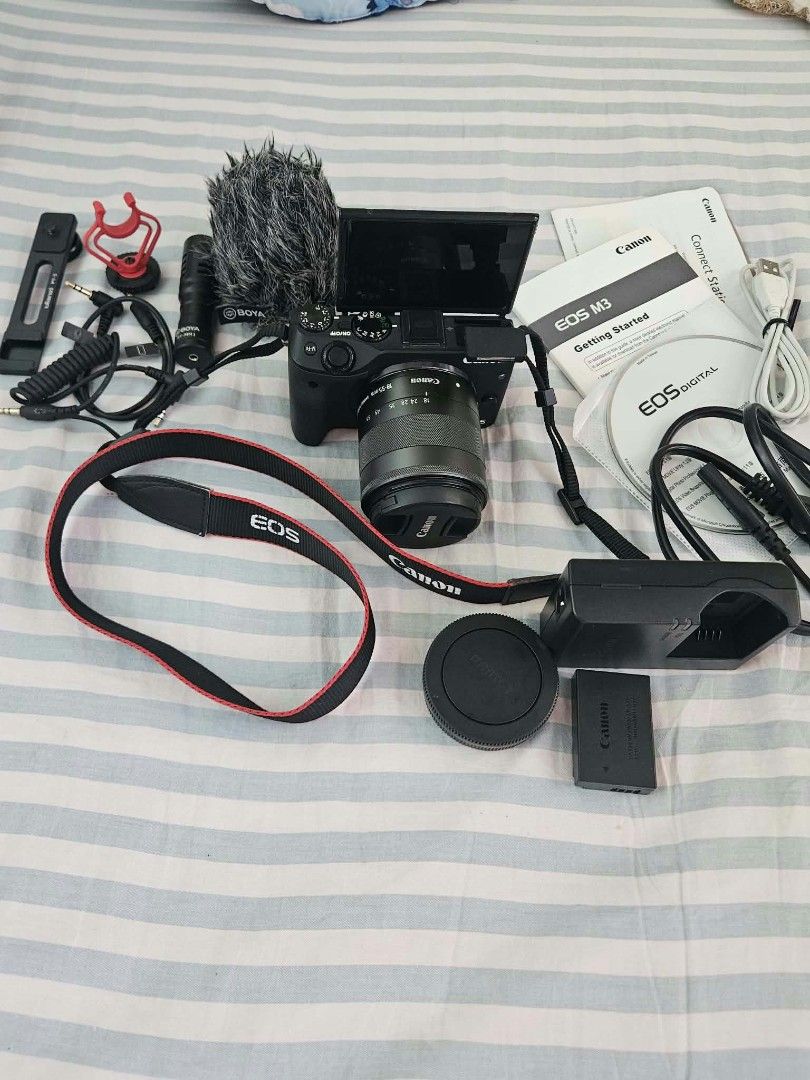 Canon EOS M3 Mirrorless Camera with 18-55mm Lens Kit (Category: Cameras) located in Caloocan City. Submitted by brightstar-da11 (Listing ID 1470817866, Image 1). Description: CANON EOS M3 COMPLETE VLOGGING BUNDLE 📸🎙️" Perfect starter setup for YouTube, TikTok, and photography! Canon EOS M3 Specifications: - 24.2MP APS-C CMOS sensor - DIGIC 6 image processor - Full HD 1080p video recording - 3-inch tilting touchscreen - Hybrid CMOS AF III with u