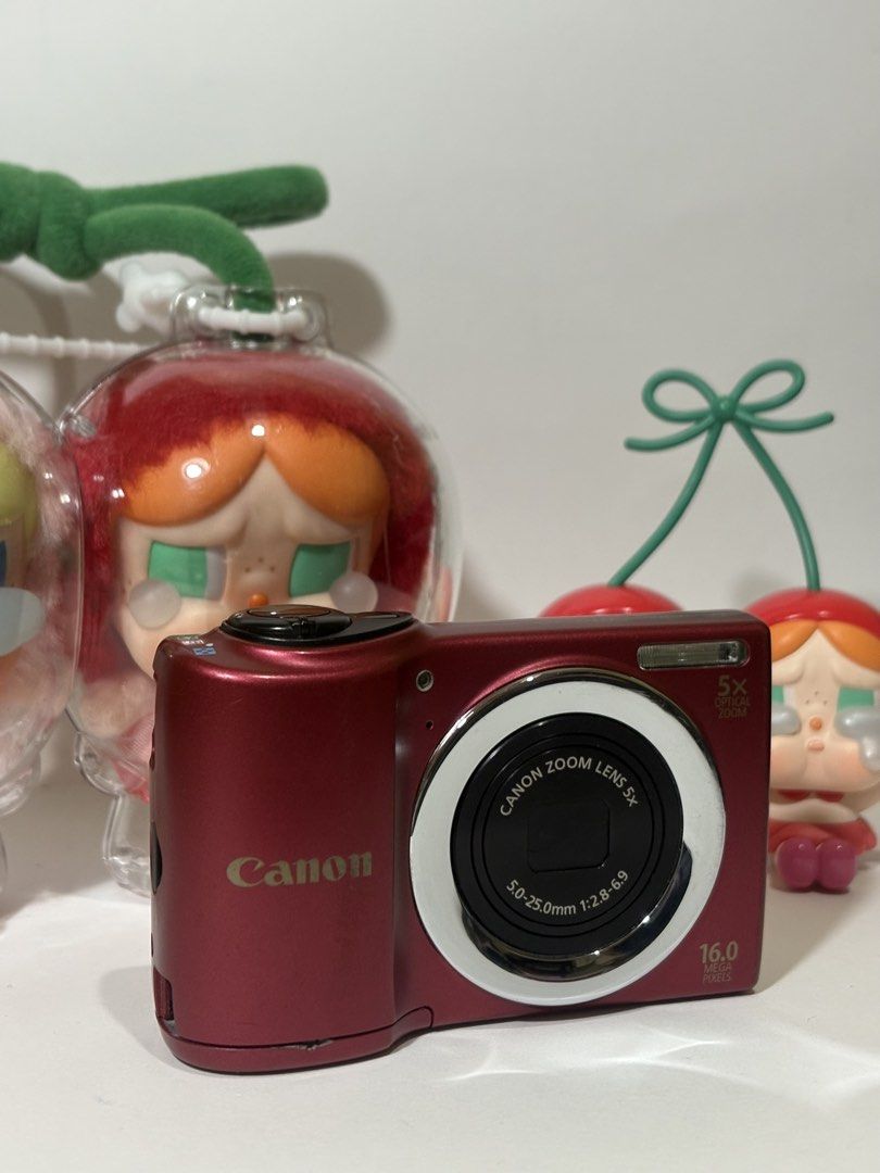 Canon Powershot a810 (red) (Category: Cameras) located in Manila. Submitted by pleasesellmecheapstuff (Listing ID 1470748611, Image 1). Description: 🍒Canon Powershot a810 (red) 📸✨ - 16 Mp - with red light 💗Selling Price: Php 5,499 ✨ready to use‼️ (dm/comment for more sample shots) 💗Condition: - No functional issues - body 8/10 (mild scratches since it is 2nd hand🫶) - battery door has small crack (see post) but doesn't affect output✨ Inclusio