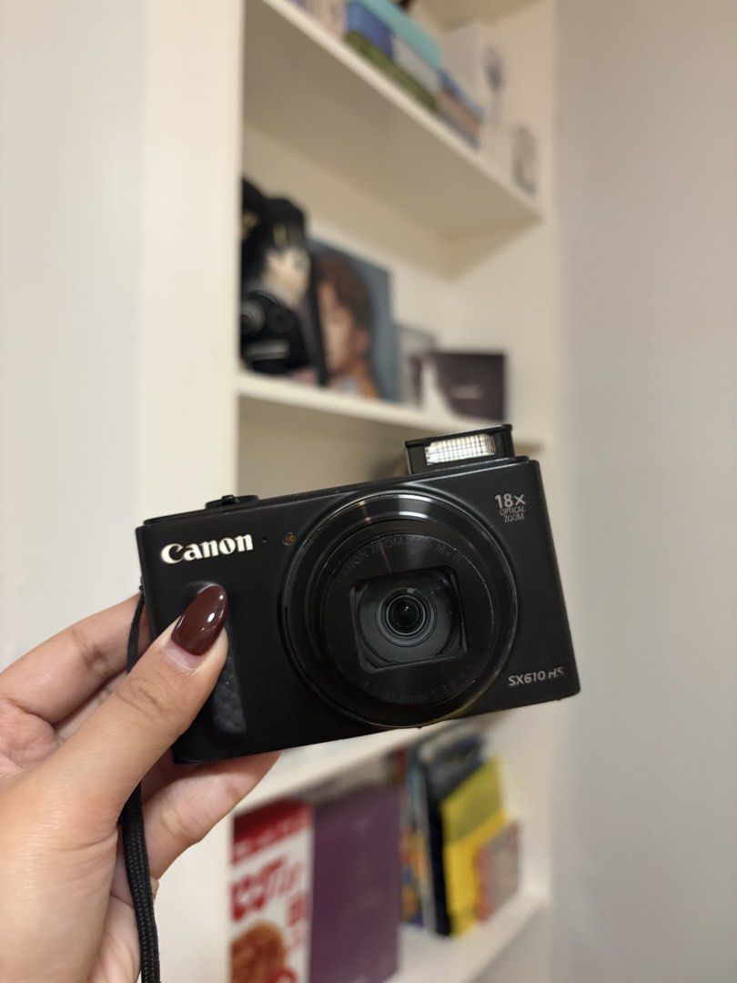 Canon PowerShot SX610 HS Black Digital Camera (Category: Cameras) located in Quezon City. Submitted by byyanna.co (Listing ID 1470840487, Image 1). Description: ୨ৎ 20.2 MP resolution + 18x optical zoom ୨ৎ captures photos and videos in 1080p Full HD ୨ৎ design: sleek, compact, and easy to bring anywhere ୨ৎ photo quality: sharp, vibrant, and detailed shots ୨ৎ fully functional — buttons, flash, zoom, and video all working properly ୨ৎ super pretty out
