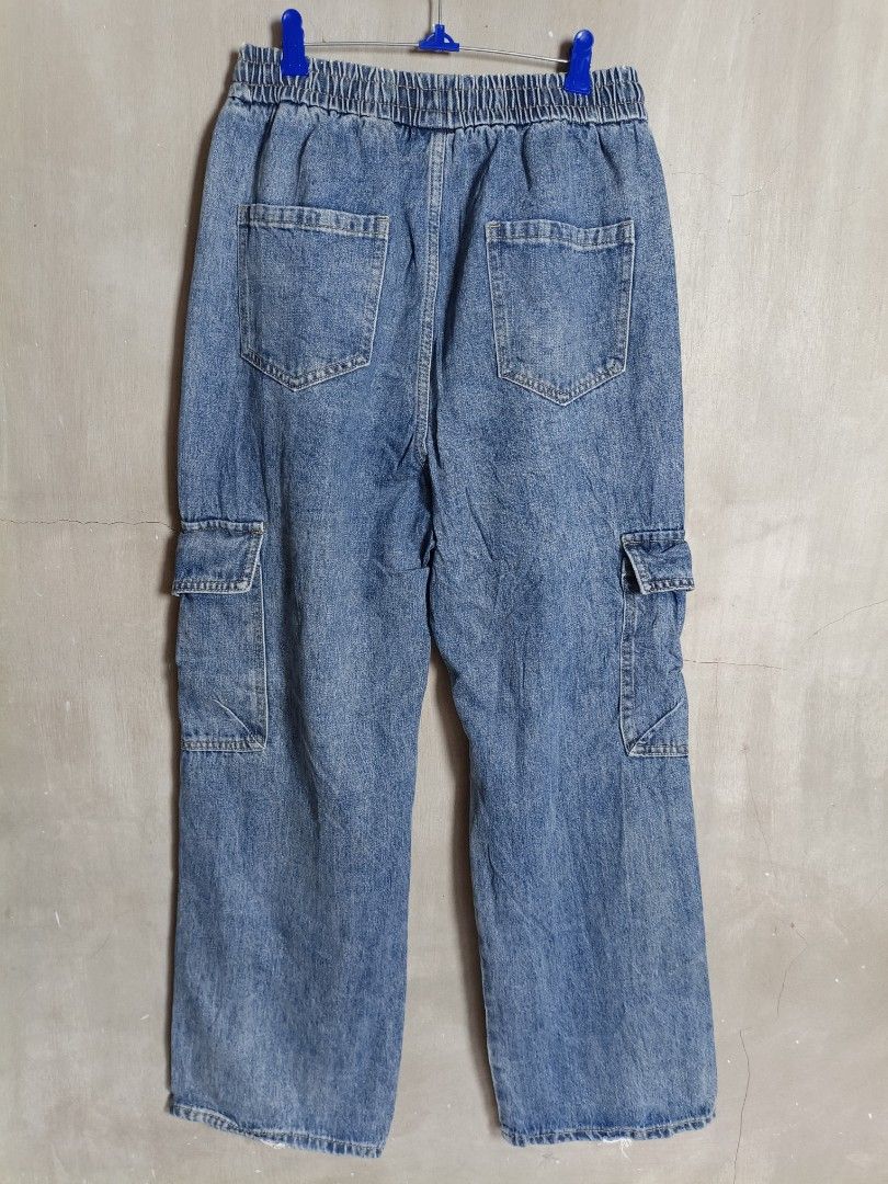 Cargo Denim Pants Elastic Waist Drawstring Blue Jeans (Category: Jeans) located in Manila. Submitted by mamijessa (Listing ID 1470836668, Image 3). Description: - Color/Finish: Blue washed denim - Waist: Elastic waistband with adjustable drawstring (fits 26 to 35 inches) - Fit: Relaxed straight leg - Pockets: Multiple utility pockets on sides and back - Measurements: 29.5-inch inseam, 41.5-inch outseam - Condition: Excellent quality - Perfect for