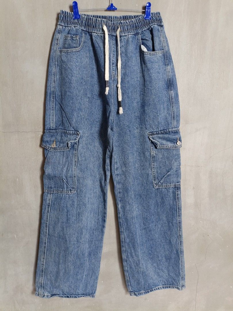 Cargo Denim Pants Elastic Waist Drawstring Blue Jeans (Category: Jeans) located in Manila. Submitted by mamijessa (Listing ID 1470836668, Image 2). Description: - Color/Finish: Blue washed denim - Waist: Elastic waistband with adjustable drawstring (fits 26 to 35 inches) - Fit: Relaxed straight leg - Pockets: Multiple utility pockets on sides and back - Measurements: 29.5-inch inseam, 41.5-inch outseam - Condition: Excellent quality - Perfect for