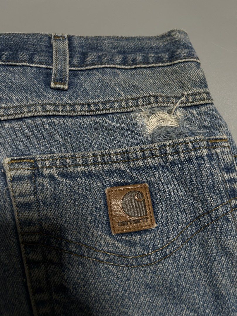 Carhartt B17 DST Denim pants (authentic) (Category: Jeans) located in Trece Martires City. Submitted by flip_flips (Listing ID 1470895058, Image 3). Description: Carhartt B17 DST Denim pants (authentic) -Dimes: 42 waist 42 length 15 tigh 9 leg open -Good condition -9.5/10 color rate -issue: right back pocket has distress hole repairable, front dirt stains washable..