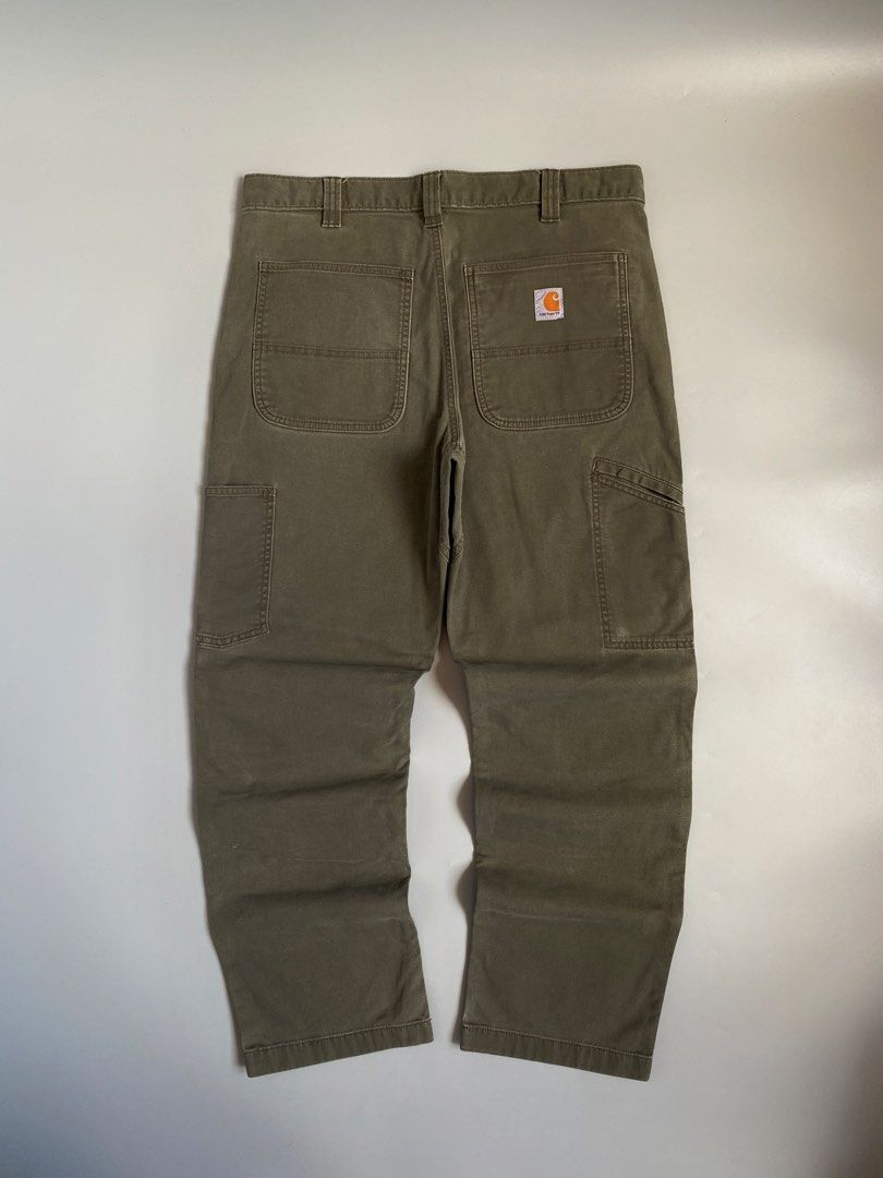 Carhartt Moss Green Double Knee Work Pants (Category: Jeans) located in Cavite. Submitted by awuuu27 (Listing ID 1470746959, Image 2). Description: C@RH@RT* Double Knee Moss Green Pants 💎 DIMES: Width-35-36/Length-40/Leg Opening-8.5/Thigh-13.5 CONDITION: 9/10 COLOR RATE: 9/10 ISSUE: minimal scratch, fade part.