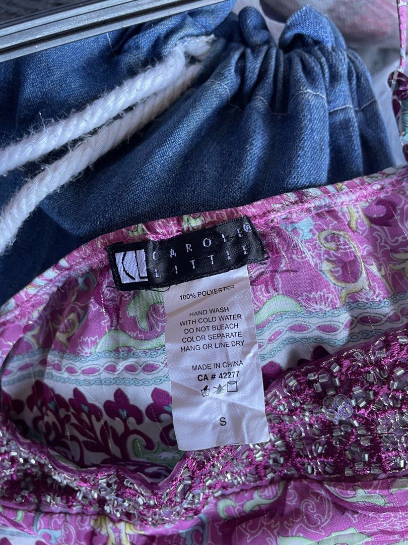 Carole Little Pink Patterned Cami Size S (Category: Sleeveless) located in Siniloan. Submitted by rethr1ft (Listing ID 1470874476, Image 2). Description: - Brand: Carole Little - Size: Small - Design: Pink & multi-color paisley/floral print with metallic gold threading - Details: Beaded & sequined neckline trim, adjustable spaghetti straps, and drawstring tie hem - Material: 100% polyester - Care: Hand wash cold (Made in China) - Condition: Excel