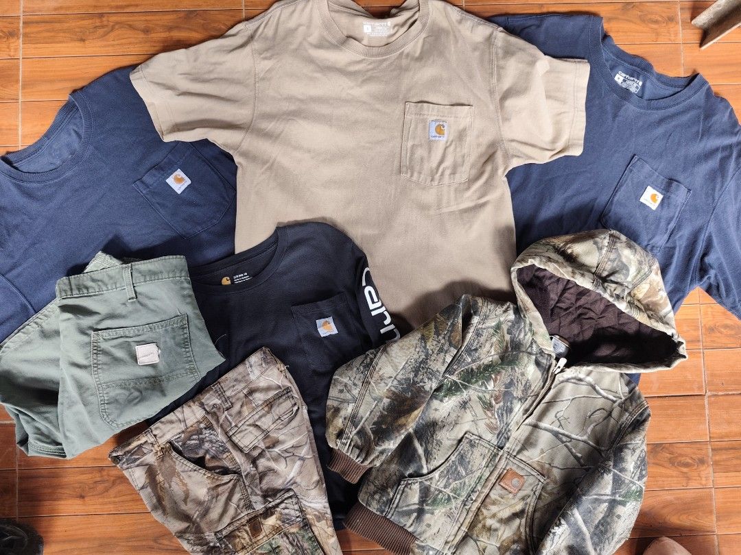 Carousell Carhartt Bundle T-Shirts Pants Jacket (Category: Tshirts & Polo Shirts ) located in Manila. Submitted by truefish-1928 (Listing ID 1470919280, Image 1). Description: - Brand: Carhartt - Condition: Great daily wear rotation - Tan and navy blue pocket t-shirts - Long sleeve shirt - Green utility pants - Camo cargo pants - Camo insulated hooded jacket - Multiple sizes and colors included - Tough, durable workwear staple pieces.