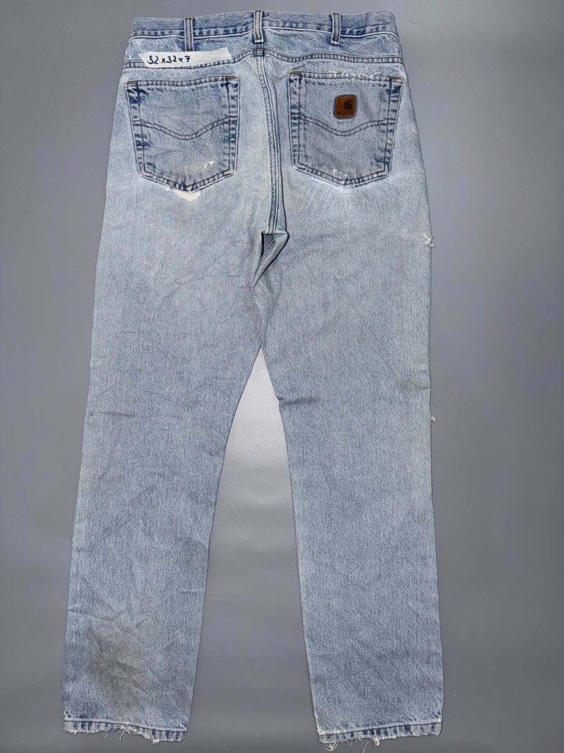 4 pcs carhartt pants (Category: Jeans) located in Santa Rosa. Submitted by n.vallermosa (Listing ID 1470918123, Image 3). Description: - Lot of 4 Carhartt work pants and jeans - Colors: Grey, beige, and light wash denim - Durable heavy-duty canvas and denim construction - Includes utility pockets and hammer loops on select styles - Condition: Visible wear, fading, distressing, stains, and frayed hems throughout - Sold as a bundle pack 6000 obo.