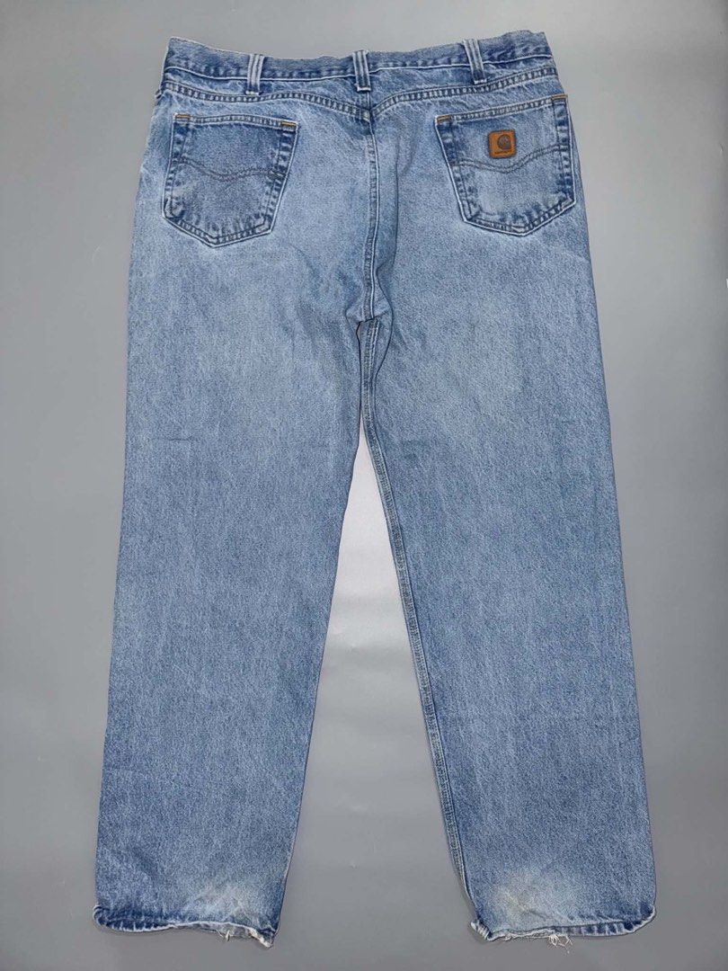 4 pcs carhartt pants (Category: Jeans) located in Santa Rosa. Submitted by n.vallermosa (Listing ID 1470918123, Image 2). Description: - Lot of 4 Carhartt work pants and jeans - Colors: Grey, beige, and light wash denim - Durable heavy-duty canvas and denim construction - Includes utility pockets and hammer loops on select styles - Condition: Visible wear, fading, distressing, stains, and frayed hems throughout - Sold as a bundle pack 6000 obo.