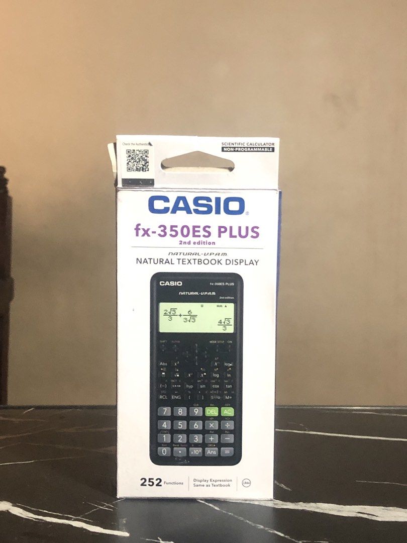 Casio fx-350ES PLUS 2nd Edition Scientific Calculator (Category: Office & Business Technology) located in Rosales. Submitted by gentlecloud.60304d (Listing ID 1470845895, Image 1). Description: - Model: Casio fx-350ES PLUS 2nd Edition (Non-programmable) - Features: 252 functions with natural textbook display - Inclusions: Original box, hard slide-on case, and user manuals - Condition: Calculator unit is clean and well-maintained; minor wear on th