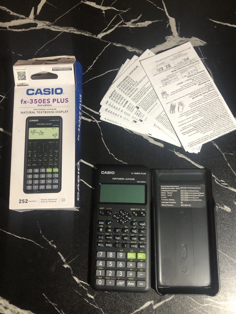 Casio fx-350ES PLUS 2nd Edition Scientific Calculator (Category: Office & Business Technology) located in Rosales. Submitted by gentlecloud.60304d (Listing ID 1470845895, Image 2). Description: - Model: Casio fx-350ES PLUS 2nd Edition (Non-programmable) - Features: 252 functions with natural textbook display - Inclusions: Original box, hard slide-on case, and user manuals - Condition: Calculator unit is clean and well-maintained; minor wear on th