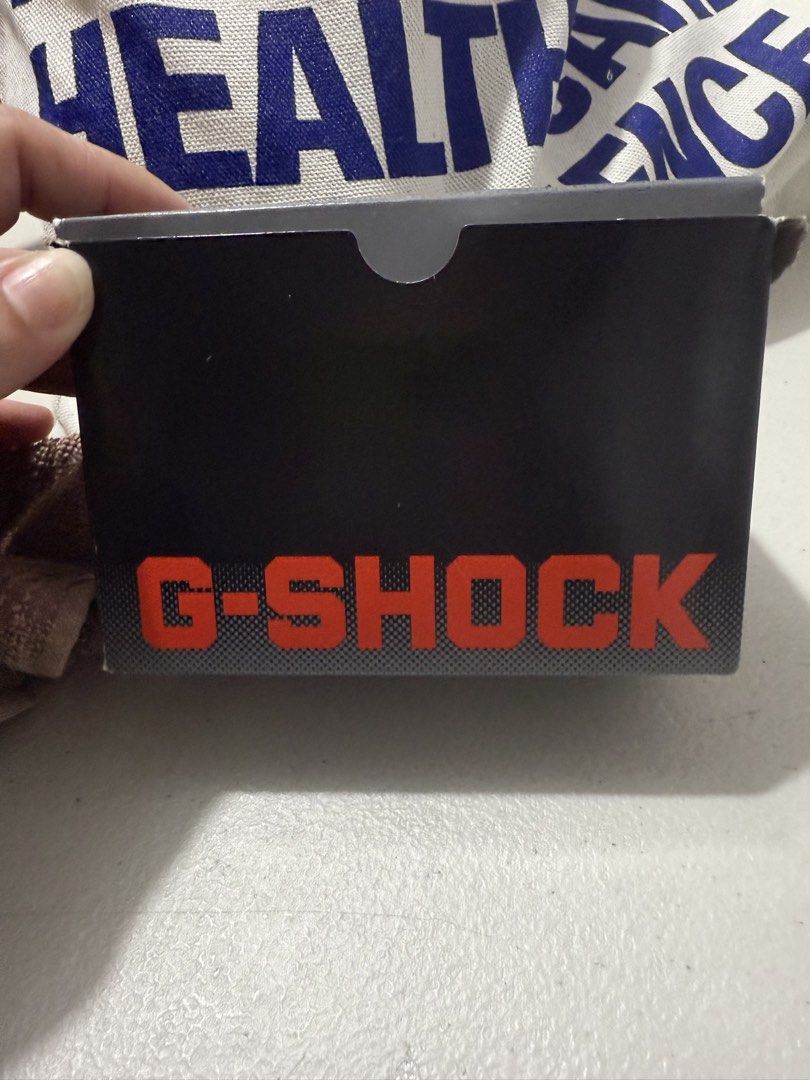 Casio G-Shock DW-9052-1VCG Watch (Category: Men's Watches) located in Manila. Submitted by sjsy103006 (Listing ID 1470852163, Image 2). Description: - Model: Casio G-Shock DW-9052-1VCG (Black with striking red lettering) - Durability: Iconic G-Shock shock resistance with 200m water resistance - Strap: Comfortable black resin strap - Inclusions: Complete set with original obox, display stand, and manual - Condition: Excellent, ready for daily wear