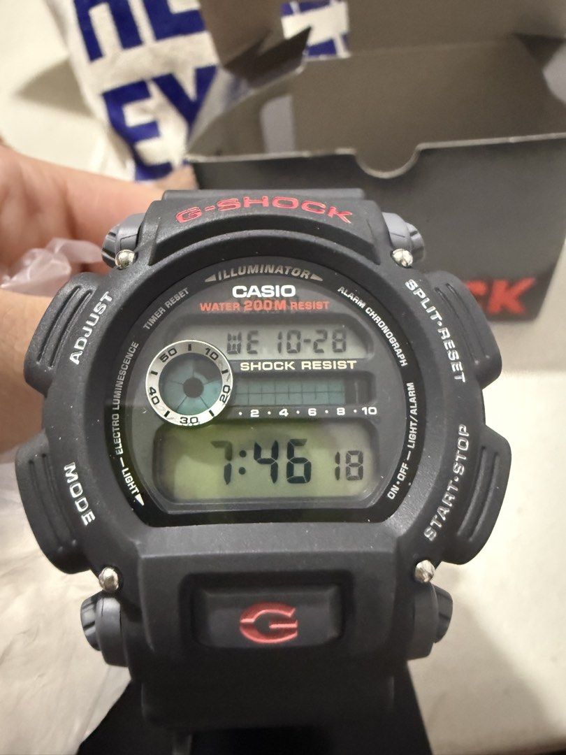 Casio G-Shock DW-9052-1VCG Watch (Category: Men's Watches) located in Manila. Submitted by sjsy103006 (Listing ID 1470852163, Image 3). Description: - Model: Casio G-Shock DW-9052-1VCG (Black with striking red lettering) - Durability: Iconic G-Shock shock resistance with 200m water resistance - Strap: Comfortable black resin strap - Inclusions: Complete set with original obox, display stand, and manual - Condition: Excellent, ready for daily wear