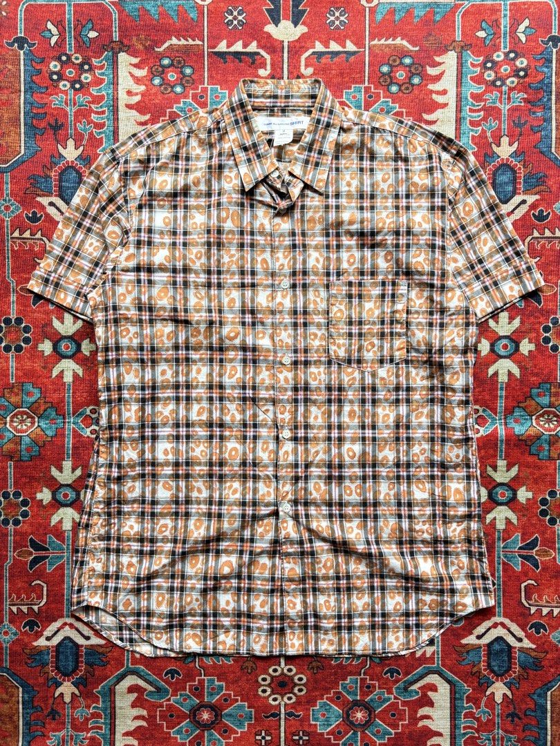 CDG COMME DES GARCONS Short Sleeve (Category: Formal Shirts) located in Dagupan City. Submitted by anyklasiko (Listing ID 1470827292, Image 1). Description: CDG COMME DES GARCONS Short Sleeve Size: M Width: 21’ Length: 29.5’ Shoulder: 18’ Sleeve: 8.5’ Price: 3499 .