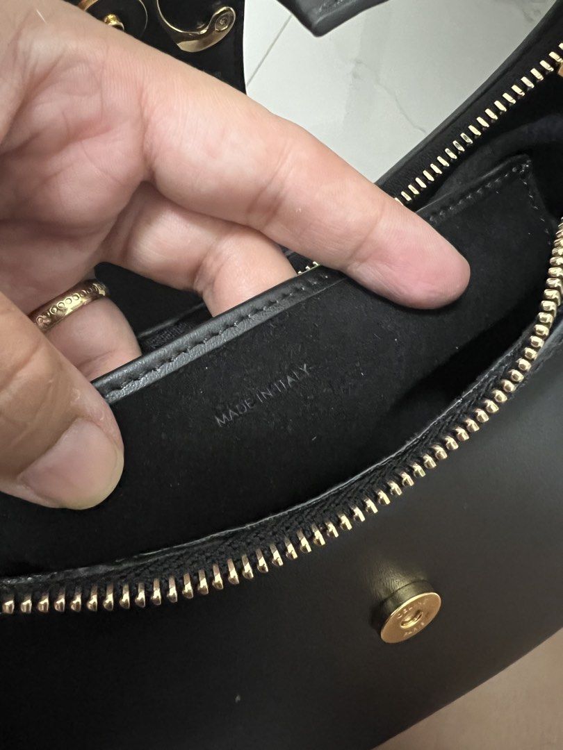 Celine Black Triomphe Ava Shoulder Bag with Dustbag (Category: Shoulder Bags) located in Abulug. Submitted by jamiecammie (Listing ID 1470820604, Image 3). Description: - Authentic Celine Ava shoulder bag - Crafted from smooth black leather with gold-tone Triomphe hardware - Secure zip top closure with engraved Celine pull - Luxurious black suede lining with an interior slip pocket - Made in Italy - Comes with original black dustbag - Perfect cla