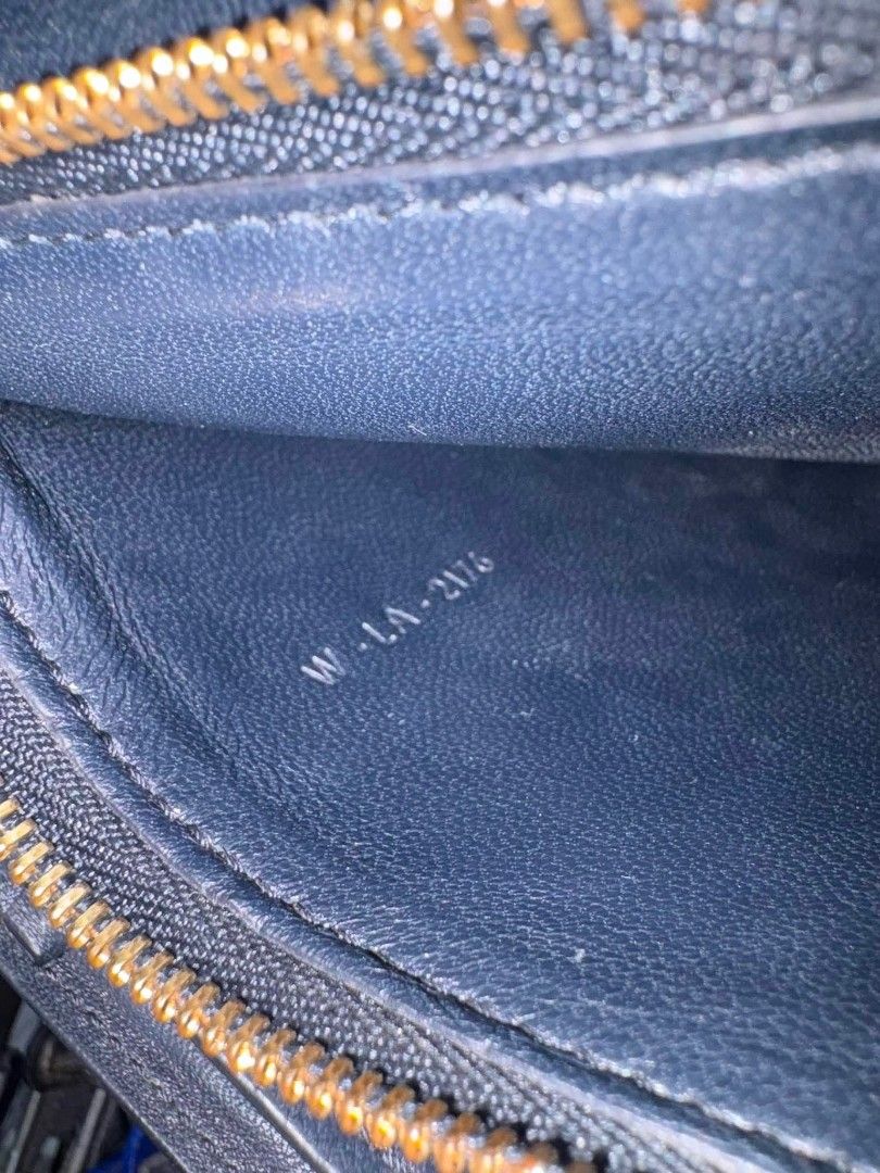 Celine Classic Box Bag Navy Blue Leather (Category: Luxury Bags & Wallets) located in Davao. Submitted by navil01 (Listing ID 1470847477, Image 3). Description: - Material: Smooth leather - Origin: Made in Italy - Hardware: Gold-tone metal clasp - Strap: Adjustable shoulder strap - Design: Structured shape with clean edges - Authenticity: Interior stamp and heat-stamped serial number.