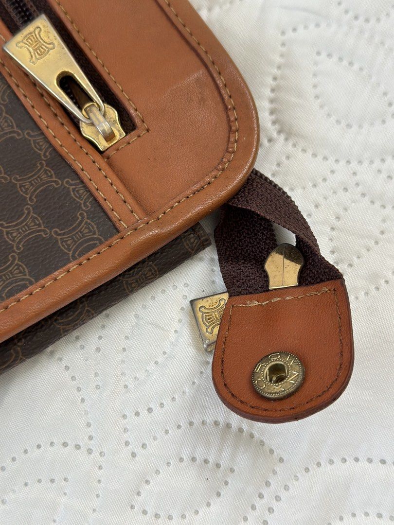 Celine Macadam Brown Monogram Shoulder Bag (Category: Luxury Bags & Wallets) located in Batangas. Submitted by enyahsnivl56498 (Listing ID 1470773891, Image 2). Description: Vintage Celine shoulder bag in classic brown Macadam monogram coated canvas with tan leather trim. Gold-tone hardware with Celine branding on the front patch, zippers, and snap button. Tan leather interior lining featuring a zippered pocket. External zipper pocket on the fron