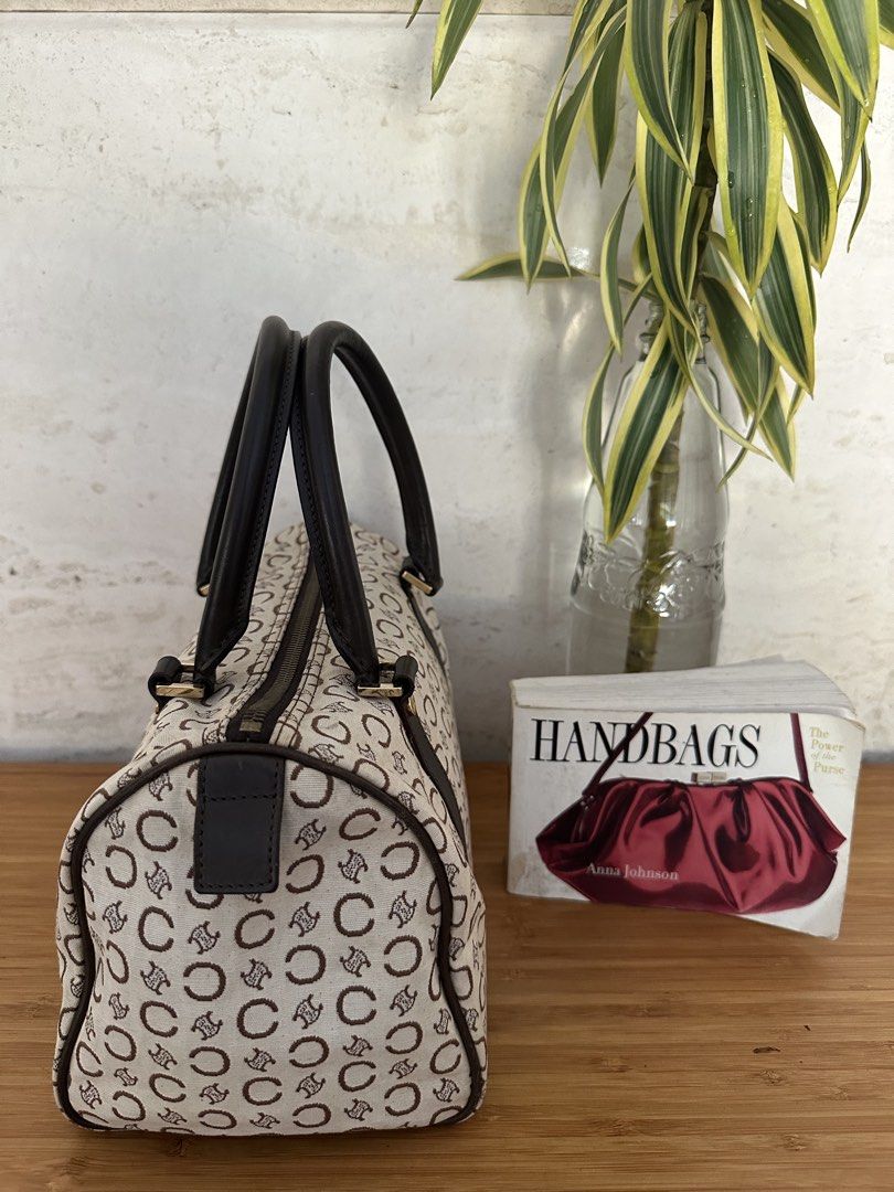 Celine Monogram Canvas Barrel Bag (Category: Luxury Bags & Wallets) located in Muntinlupa City. Submitted by belica (Listing ID 1470852584, Image 2). Description: - Brand: Celine - Style: Vintage Barrel Bag - Material: Cream and brown monogram canvas with dark brown leather handles and side straps - Hardware: Gold-tone zippers and rings - Closure: Top zip closure - Condition: Clean exterior with a structured shape.