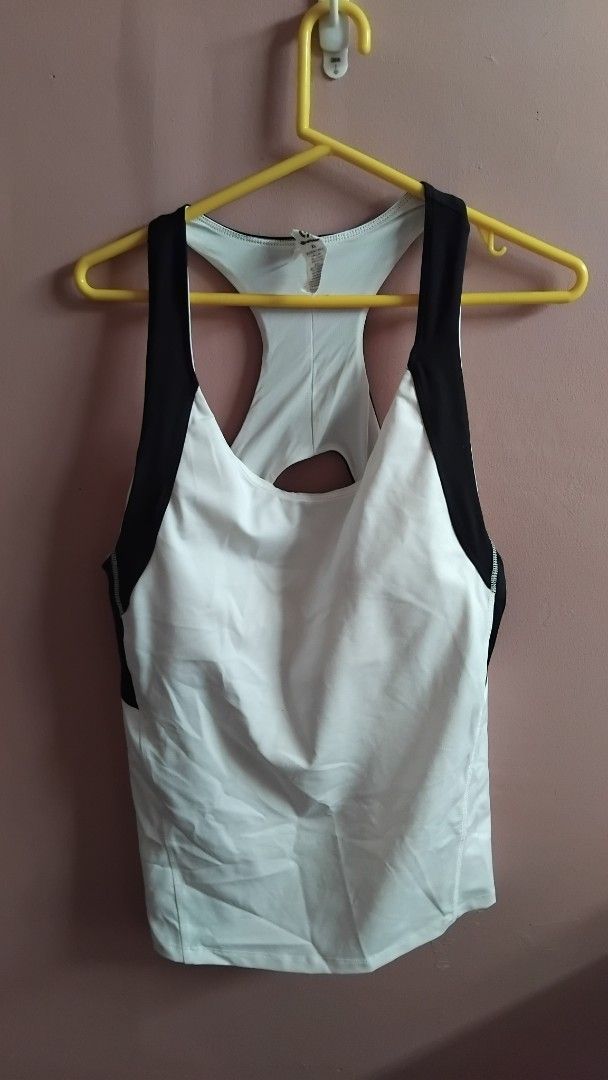 CHAMPION BLACK & WHITE RACERBACK TANK TOP (Category: Bikinis & Swimsuits) located in Iloilo. Submitted by ayinscloset (Listing ID 1470795061, Image 1). Description: 🖤 CHAMPION BLACK & WHITE RACERBACK TANK TOP Price: ₱350 (Negotiable) - Brand: Champion - Size: XL - Color: Black & White - Condition: Pre-loved - Material: 88% Polyester, 12% Spandex ✨ Original Champion activewear ✨ Sporty racerback design ✨ Stretchable and lightweight fabric ✨ Black