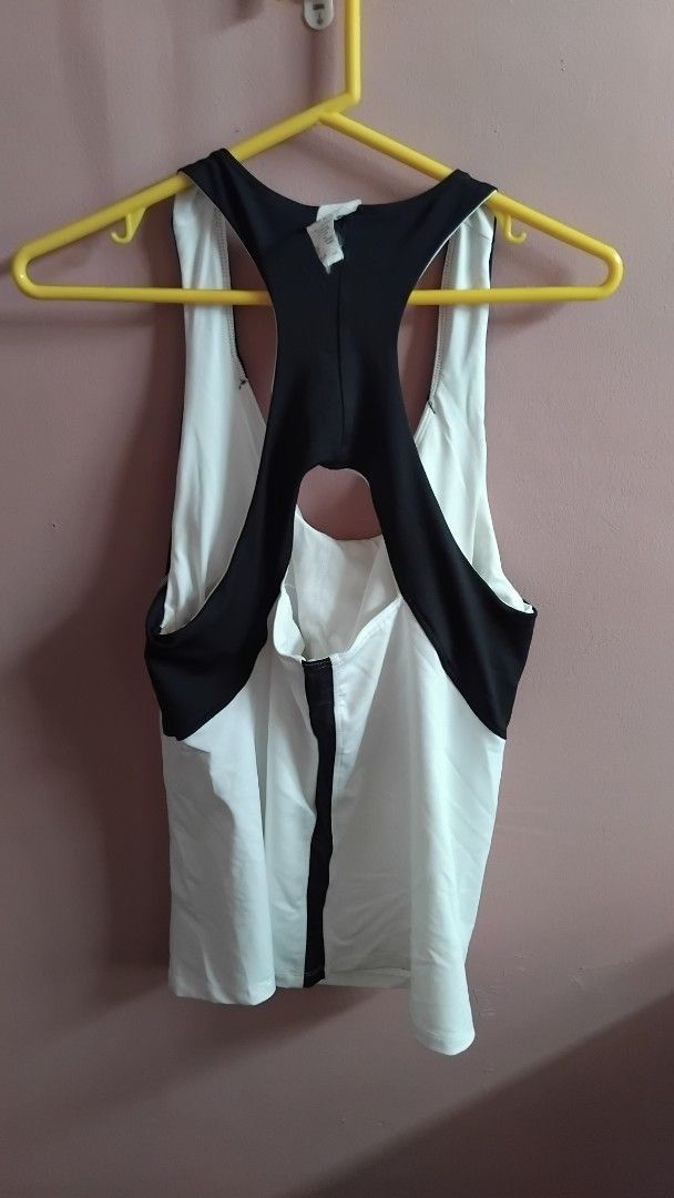 CHAMPION BLACK & WHITE RACERBACK TANK TOP (Category: Bikinis & Swimsuits) located in Iloilo. Submitted by ayinscloset (Listing ID 1470795061, Image 3). Description: 🖤 CHAMPION BLACK & WHITE RACERBACK TANK TOP Price: ₱350 (Negotiable) - Brand: Champion - Size: XL - Color: Black & White - Condition: Pre-loved - Material: 88% Polyester, 12% Spandex ✨ Original Champion activewear ✨ Sporty racerback design ✨ Stretchable and lightweight fabric ✨ Black