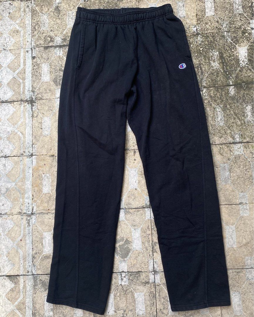 Champion Black Sweatpants Size M (Category: Joggers) located in Imus. Submitted by frootiloots4103 (Listing ID 1470768348, Image 1). Description: - Brand: Champion - Color: Black - Size: Medium - Fit: Classic casual fit - Waistband: Elastic with interior drawstring - Pockets: Two functional side pockets - Branding: Embroidered Champion logo near the left pocket - Authenticity: 100% authentic athleticwear tag intact - Styling: Easy to match with t