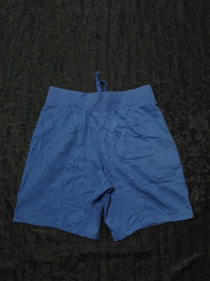 Champion Blue Sweatshorts (Category: Shorts) located in Manila. Submitted by tristan12_13 (Listing ID 1470890725, Image 3). Description: - Brand: Champion - Item: Blue Sweatshorts - Size: Medium - Dimensions: Waist- 30-34 with adjustable lace, Length- 19, Hem- 12 - Details: Embroidered script logo near hem, single right back pocket - Best for: Casual lounging or workouts.