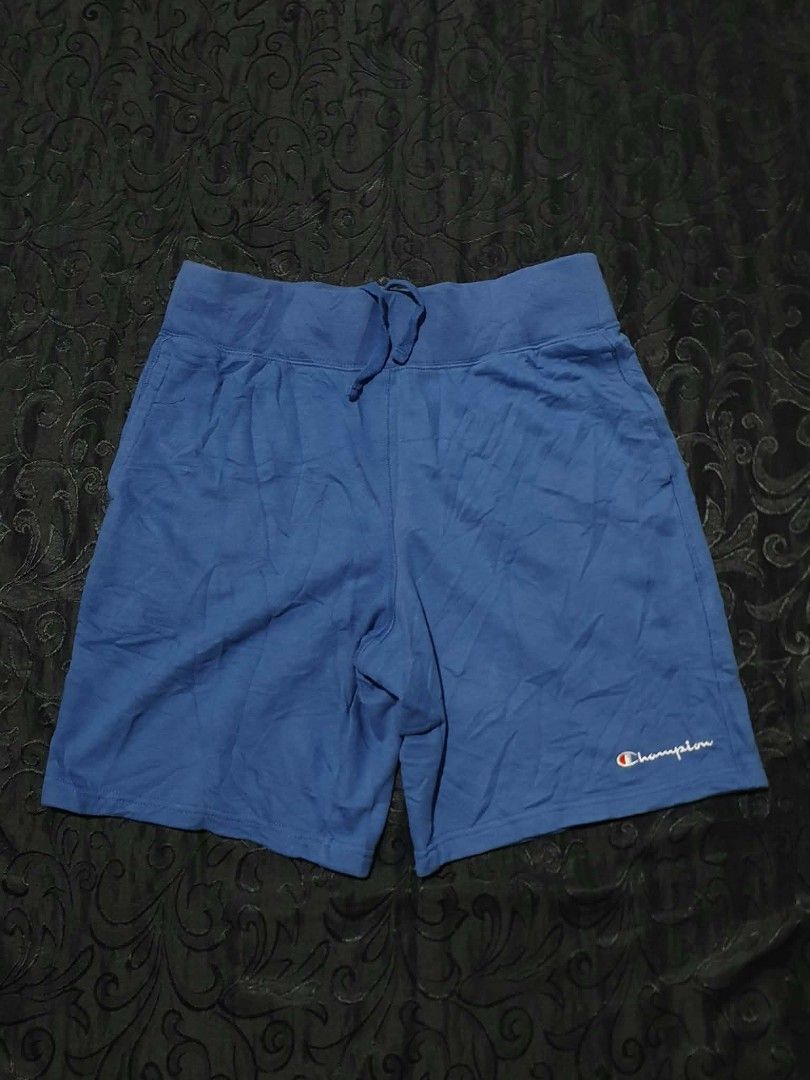 Champion Blue Sweatshorts (Category: Shorts) located in Manila. Submitted by tristan12_13 (Listing ID 1470890725, Image 1). Description: - Brand: Champion - Item: Blue Sweatshorts - Size: Medium - Dimensions: Waist- 30-34 with adjustable lace, Length- 19, Hem- 12 - Details: Embroidered script logo near hem, single right back pocket - Best for: Casual lounging or workouts.