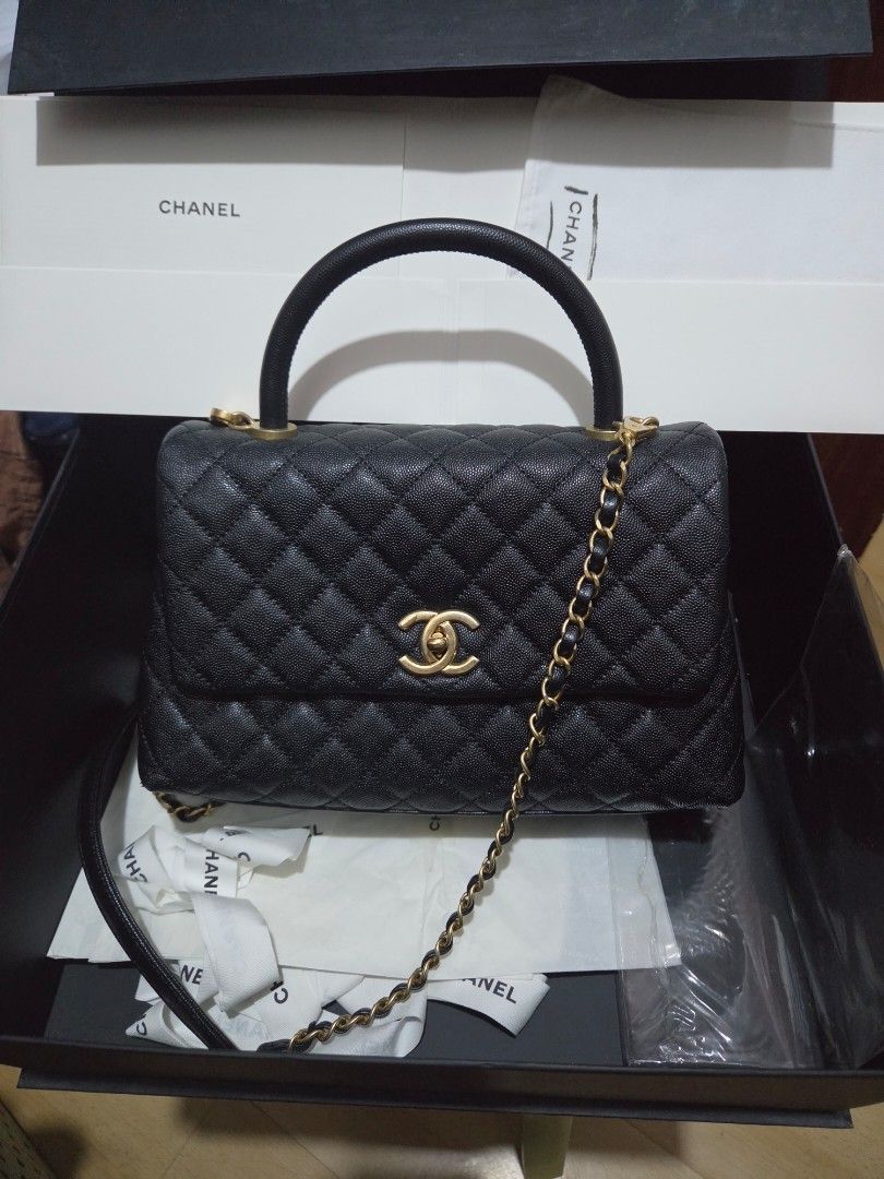 Chanel Black Caviar Leather Handle Flap Bag (Category: Luxury Bags & Wallets) located in Las Pinas. Submitted by swiftdragon_0c099a (Listing ID 1470889496, Image 1). Description: Authentic black caviar leather Chanel flap bag with gold hardware, top handle, and removable chain strap. Features the iconic CC turn-lock closure and quilted design. Comes complete with its original box and dust bags. PM to order! .