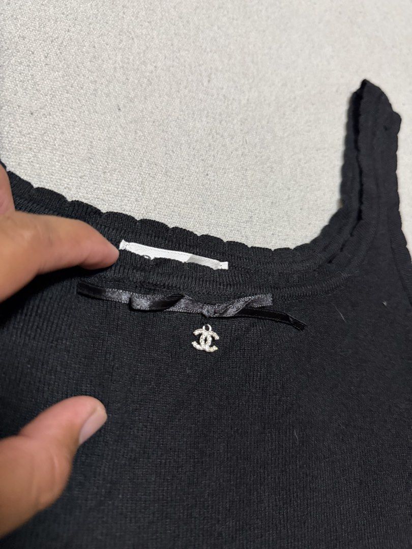CHANEL Emblem Knit Crop Top (Category: Sleeveless) located in Bulacan. Submitted by sanjisthrift (Listing ID 1470806702, Image 3). Description: Size XSmall Width 13 Length 17 Excellent Condition 9.5/10.