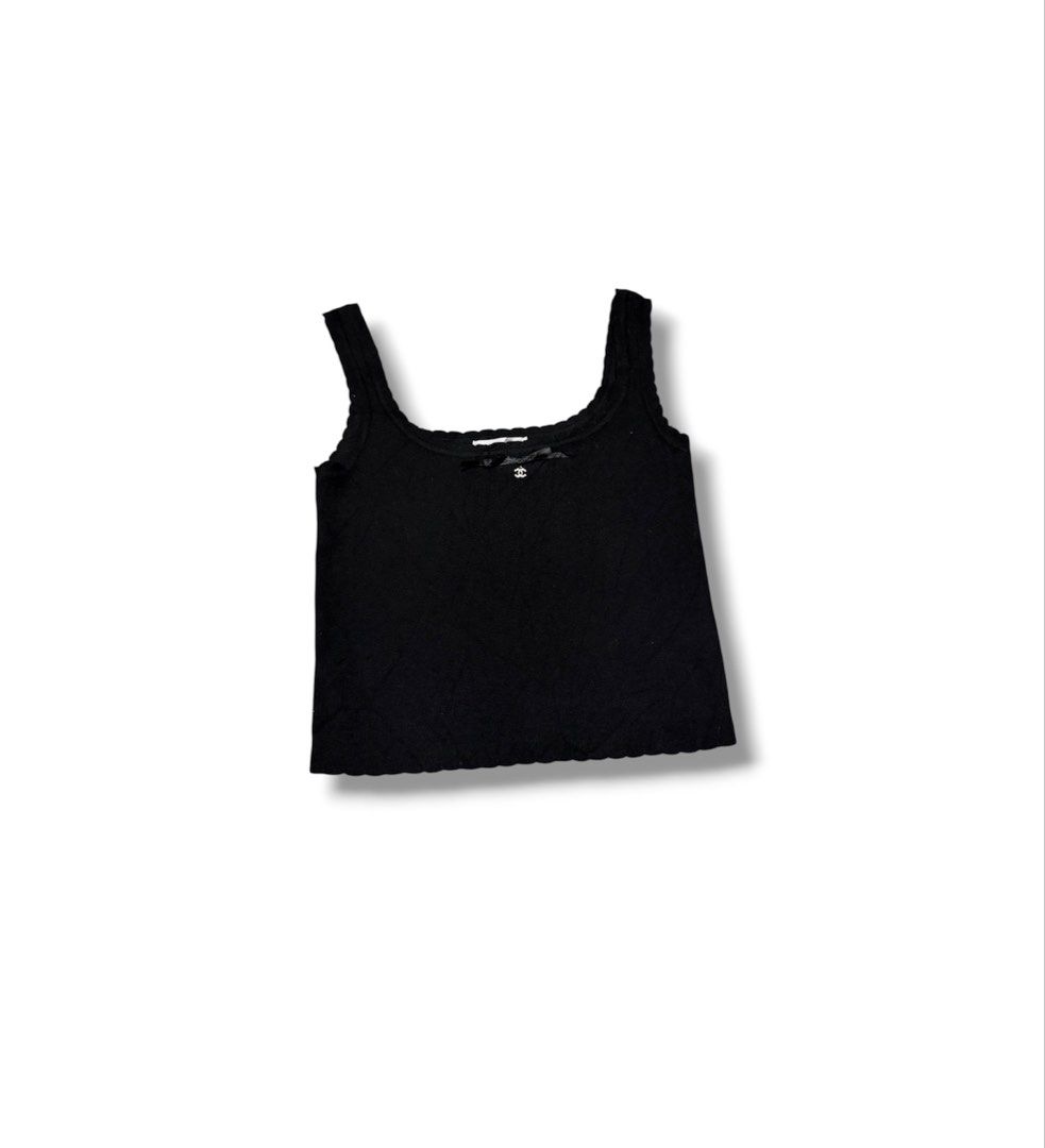 CHANEL Emblem Knit Crop Top (Category: Sleeveless) located in Bulacan. Submitted by sanjisthrift (Listing ID 1470806702, Image 1). Description: Size XSmall Width 13 Length 17 Excellent Condition 9.5/10.