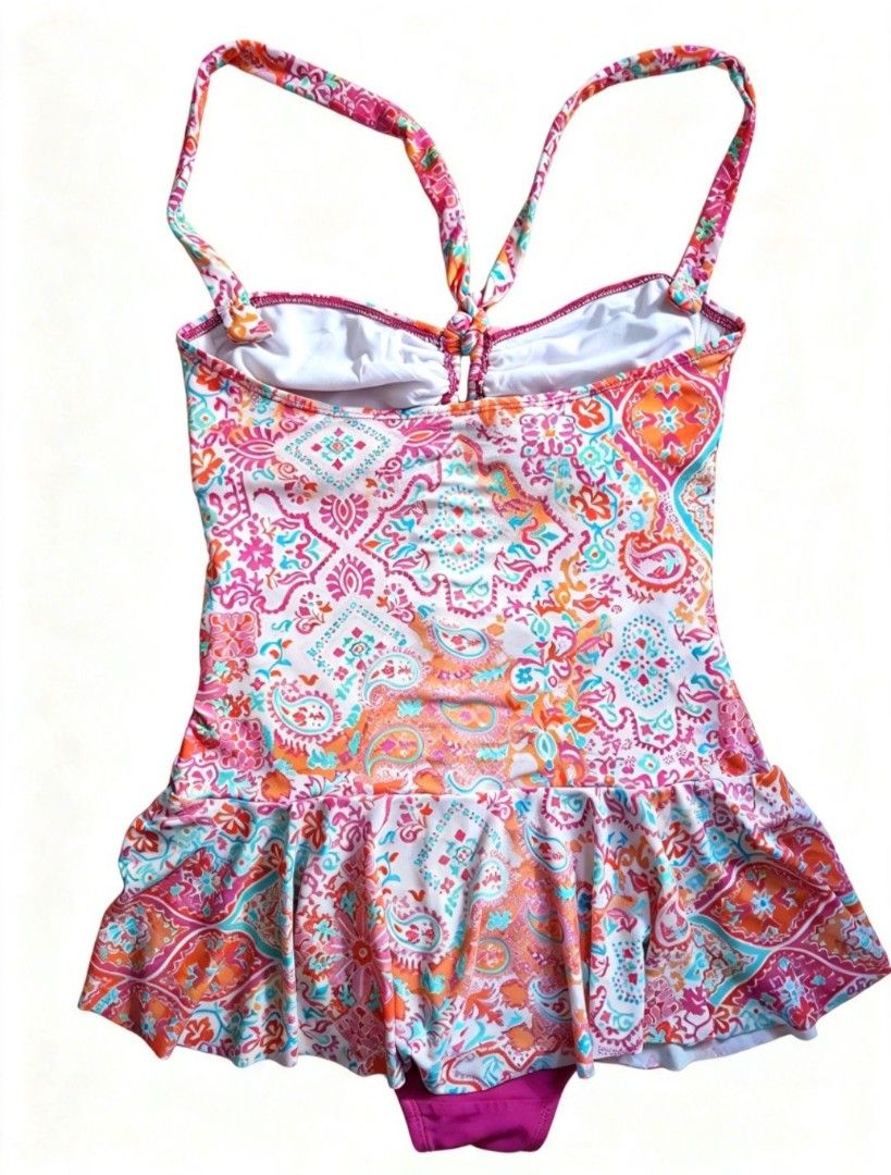 Chaps Skirted One-Piece Swimsuit Size US 10 (Category: Bikinis & Swimsuits) located in Quezon City. Submitted by ana-chan (Listing ID 1470784160, Image 2). Description: - Brand: Chaps - Style: One-piece swimsuit with skirted bottom - Print/Color: Vibrant colorful paisley - Size: US 10 / UK 14 / EU 42 (MEDIUM-LARGE - Features: Supportive front ruching, adjustable halter ties, and built-in shelf bra - Origin: Made in Indonesia - Condition: Great br