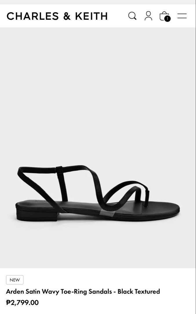 Charles & Keith Arden Satin Wavy Toe-Ring Sandals (Category: Flats & Sandals) located in Mandaluyong City. Submitted by kthln (Listing ID 1470772376, Image 3). Description: - Brand/Model: Charles & Keith Arden Satin Wavy Toe-Ring Sandals - Size: 38 (marked on sole) - With box Bought from Changi Airport RFS: I realized the size is too big after using it once. .