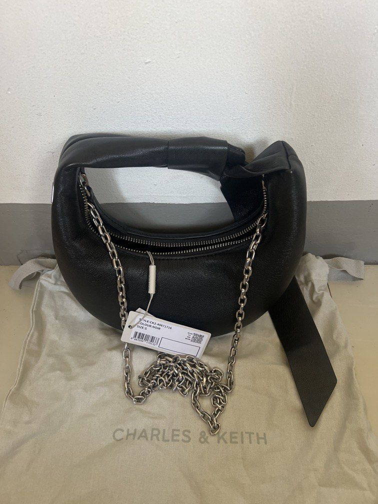 Charles & Keith sling bag detachable (Category: Cross-body Bags) located in Las Pinas. Submitted by gaeley (Listing ID 1470761921, Image 1). Description: store bought super pretty in actual.