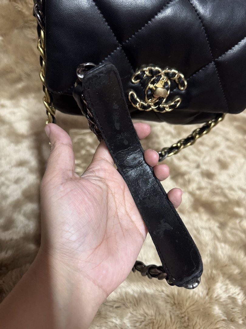 Ch*nel 19 Black Leather Flap Bag (off) (Category: Luxury Bags & Wallets) located in Manila. Submitted by thebagbudget (Listing ID 1470758805, Image 3). Description: CH*NEL 19 FLAP BAG (off) 👜 Classic black quilted design ✨ Gold-tone chain detailing 📏 Size: 10 × 7 inches 🖤 Clean and ready to use! 💰 Price: ₱1,599 + shipping fee Condition: Pre-loved with minor leather scratches and visible signs of wear on the strap. Please check all photos care