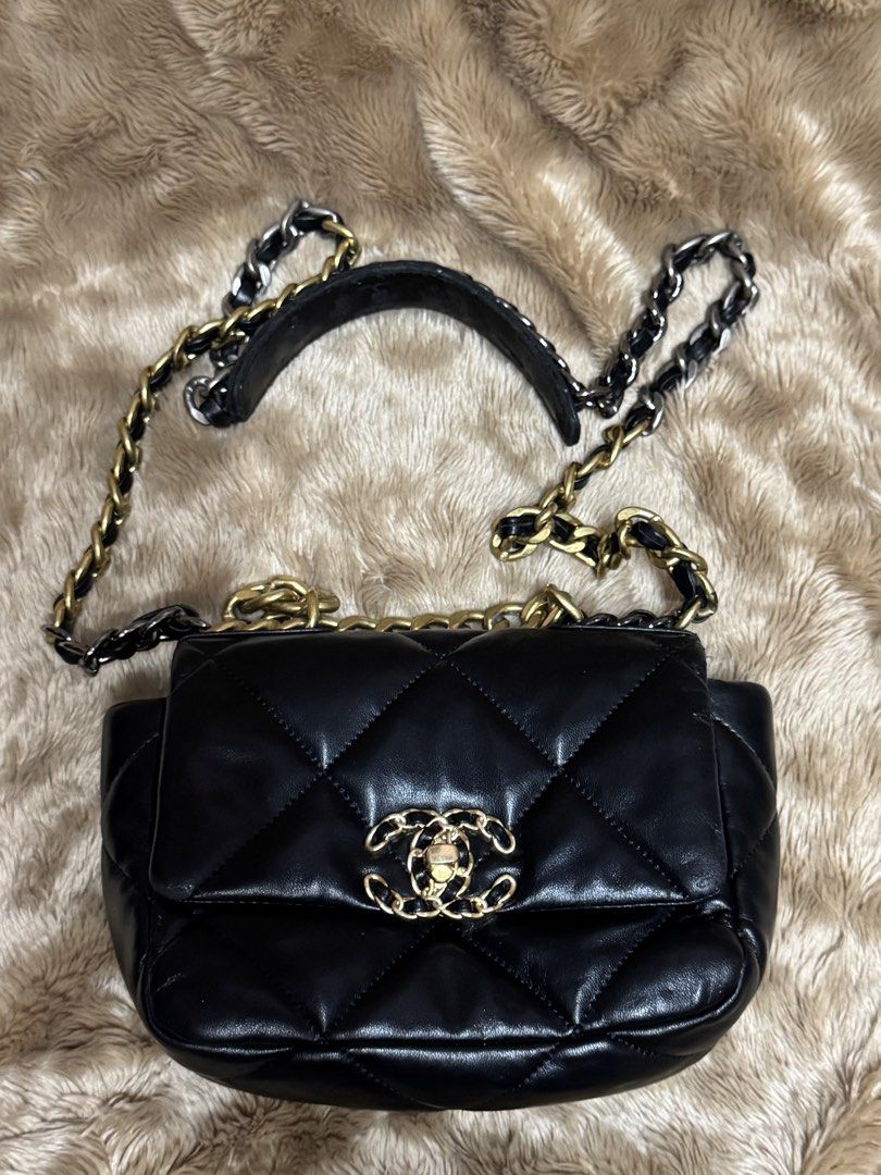 Ch*nel 19 Black Leather Flap Bag (off) (Category: Luxury Bags & Wallets) located in Manila. Submitted by thebagbudget (Listing ID 1470758805, Image 2). Description: CH*NEL 19 FLAP BAG (off) 👜 Classic black quilted design ✨ Gold-tone chain detailing 📏 Size: 10 × 7 inches 🖤 Clean and ready to use! 💰 Price: ₱1,599 + shipping fee Condition: Pre-loved with minor leather scratches and visible signs of wear on the strap. Please check all photos care