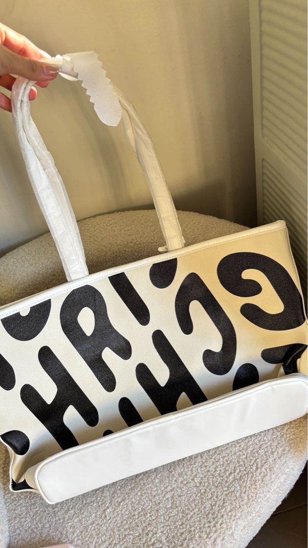 Christ Ng Logo Tote (Category: Tote Bags) located in Taguig. Submitted by renzms (Listing ID 1470816410, Image 2). Description: • with dust bag only • on hand & ready to ship • actual photos | what you see is what you exactly get! • shipping nationwide via tiktok co.
