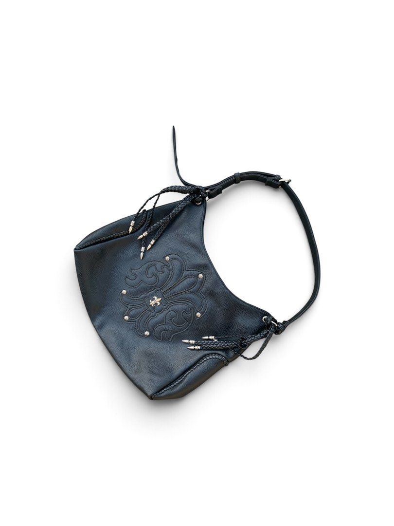 Chrome hearts fleur shoulder bag (Category: Shoulder Bags) located in Lipa City. Submitted by inglowetrust (Listing ID 1470757202, Image 2). Description: Chrome hearts fleur hobo bag Length:12 Width:14 Type: Hobo / Shoulder Bag Material: PU Leather Detail: Fleur emboss + studs Strap: Adjustable with braided accents Condition:10/10 1399+SF Dm for more details 📥.