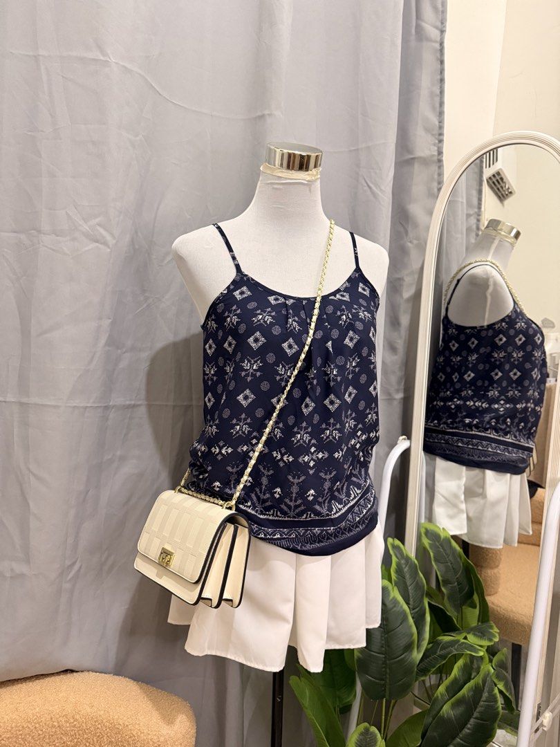 Classy Blue Top (Category: Sleeveless) located in Quezon City. Submitted by kaye_oineza (Listing ID 1470930987, Image 3). Description: Small.