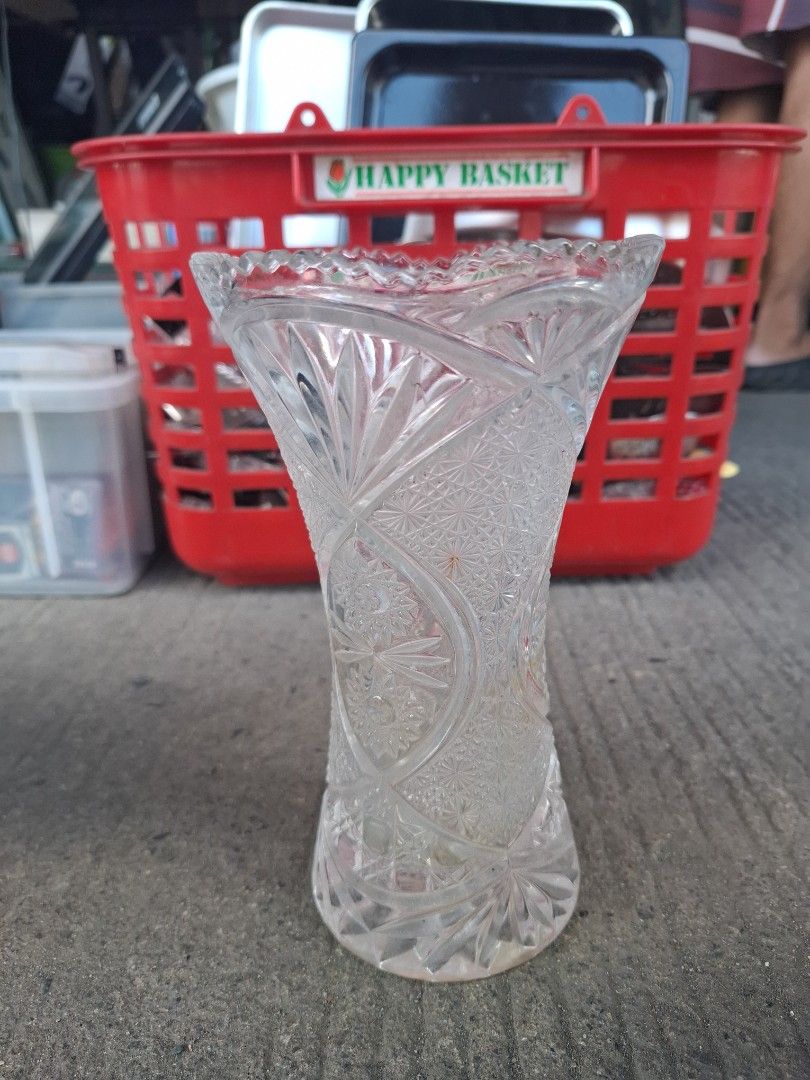 Clear Cut Glass Flower Vase (Category: Vases & Decorative Bowls) located in Manila. Submitted by rocksolid227 (Listing ID 1470770785, Image 2). Description: - Stunning clear glass vase featuring detailed cut patterns all over - Flared top opening and heavy textured design for an elegant look - Solid build with a heavy base to keep it stable - Ideal centerpiece for dining tables or bookshelves - Perfect for holding fresh flowers nicely.