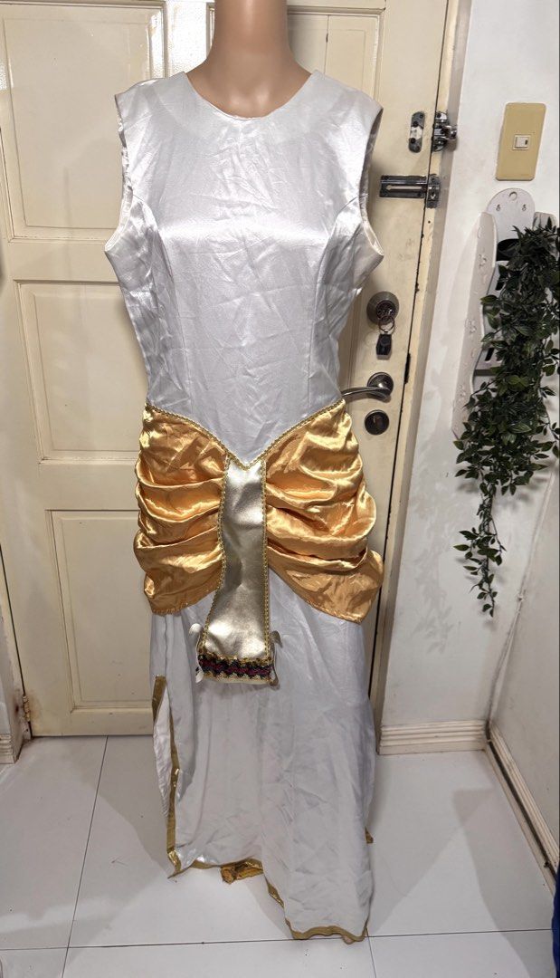 Cleopatra Costume/M-L (Category: Dresses) located in San Juan City. Submitted by matchlessgetup.ph (Listing ID 1470807939, Image 2). Description: Bring out regal Queen of the Nile vibes with this stunning, eye-catching costume! Perfect for school pageants (United Nations Day / Buwan ng Wika), themed parties, Halloween, costume competitions, or cosplay events. Includes an ornate central gold panel with detailed trim work at the hem and a matching 