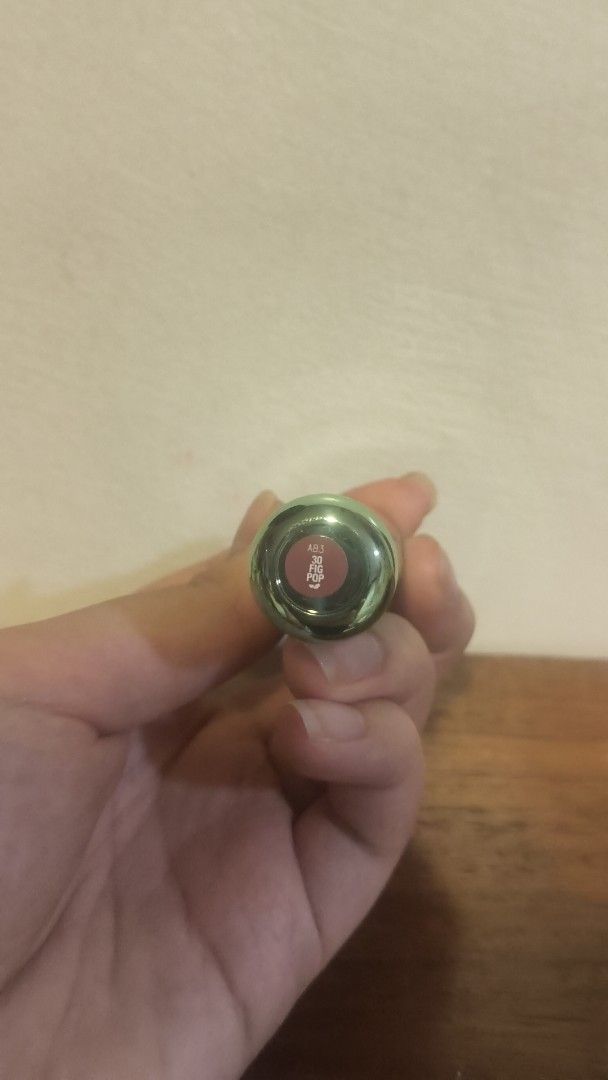 Clinique Pop Lip Colour + Primer - Fig Pop (Category: Makeup) located in Davao. Submitted by yvanaavik_sulit (Listing ID 1470894377, Image 2). Description: - Brand: Clinique - Shade: 30 Fig Pop (great everyday neutral) - Packaging: Metallic green and silver tube - Formula: Smooth with built-in primer - Condition: Used a few times, plenty of product left.