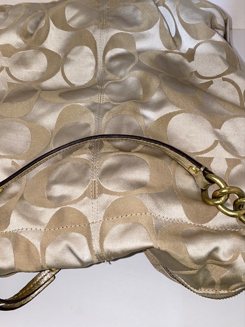 coach brooke (Category: Luxury Bags & Wallets) located in Cebu City. Submitted by vaultsbypj (Listing ID 1470893218, Image 2). Description: coach brooke in metallic gold ⭐️🌼💛 authentic vintage ykk zippers gold hardwares (with fading) intact patterns with no visible scratches with creed inside the strap leather are a little damage/color around the strap is fading, no other issues still negotiable 📍 cebu city! can ship nationwide via jnt. 💌.