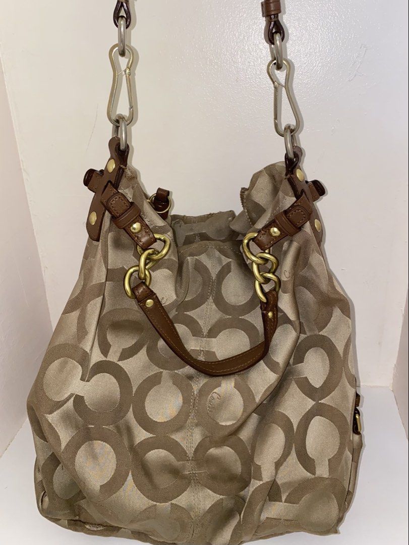 coach brooke (Category: Luxury Bags & Wallets) located in Cebu City. Submitted by vaultsbypj (Listing ID 1470893472, Image 1). Description: coach brooke in brown 🥥📦🥮🤎 authentic vintage ykk zippers gold hardwares (with fading) some patterns may have visible scratches with creed inside the strap leather are intact, no other issues still negotiable 📍 cebu city! can ship nationwide via jnt. 💌.
