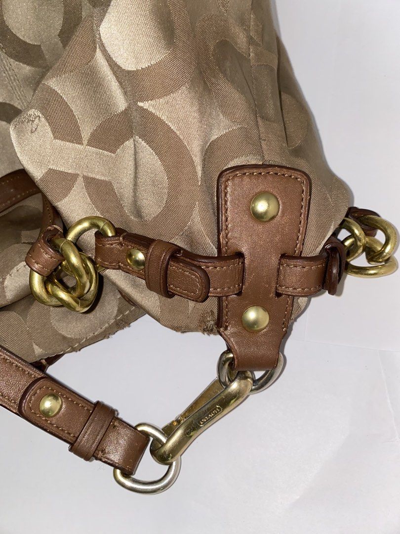 coach brooke (Category: Luxury Bags & Wallets) located in Cebu City. Submitted by vaultsbypj (Listing ID 1470893472, Image 3). Description: coach brooke in brown 🥥📦🥮🤎 authentic vintage ykk zippers gold hardwares (with fading) some patterns may have visible scratches with creed inside the strap leather are intact, no other issues still negotiable 📍 cebu city! can ship nationwide via jnt. 💌.
