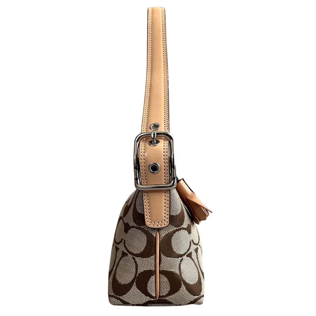 Coach Brown Shoulder Bag (Category: Luxury Bags & Wallets) located in Davao. Submitted by ghoulsnightincloset (Listing ID 1470849395, Image 3). Description: .•COLOR: Brown/Tan Signature Canvas with Beige/Light Brown Leather Trim .•STYLE: Vintage Signature Canvas Mini Baguette / Shoulder Bag .•CONDITION: USED - Overall slight signs of use, stains on the handle, and small scratches on fittings; still a usable product ୨୧ PRE-ORDER FROM JAPAN 🇯🇵 ⏳ 