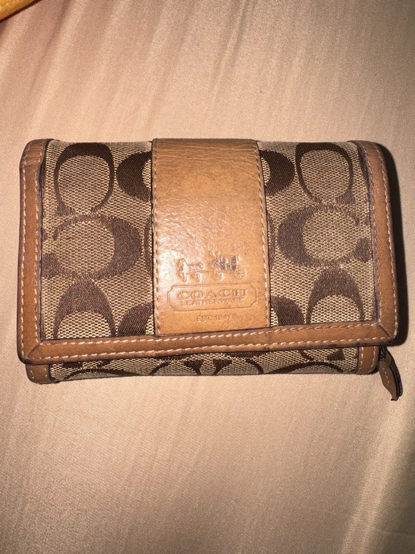Coach brown wallet (Category: Wallets & Card holders) located in Manila. Submitted by chskaiode (Listing ID 1470811677, Image 2). Description: Original brown coach wallet RFS: not using anymore.