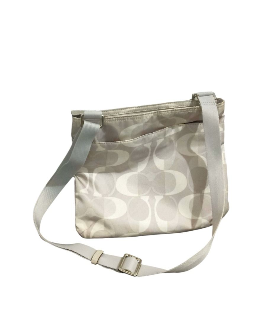 ⚜️Coach Dream C File Bag (Category: Luxury Bags & Wallets) located in Manila. Submitted by 74_tiger (Listing ID 1470818471, Image 2). Description: Item: Coach Dream C File Bag Condition: Like New Material: Nylon 💯% Authentic Silver / Light Gray Split "C" Print With Patent Fabric Trim Zip-Top Closure, Fabric Lining Outside Zip & Open Pockets With Adjustable Nylon Strap Crossbody Or Shoulder Bag Just Need Light Wash Clean Inner Lining No Damage / 