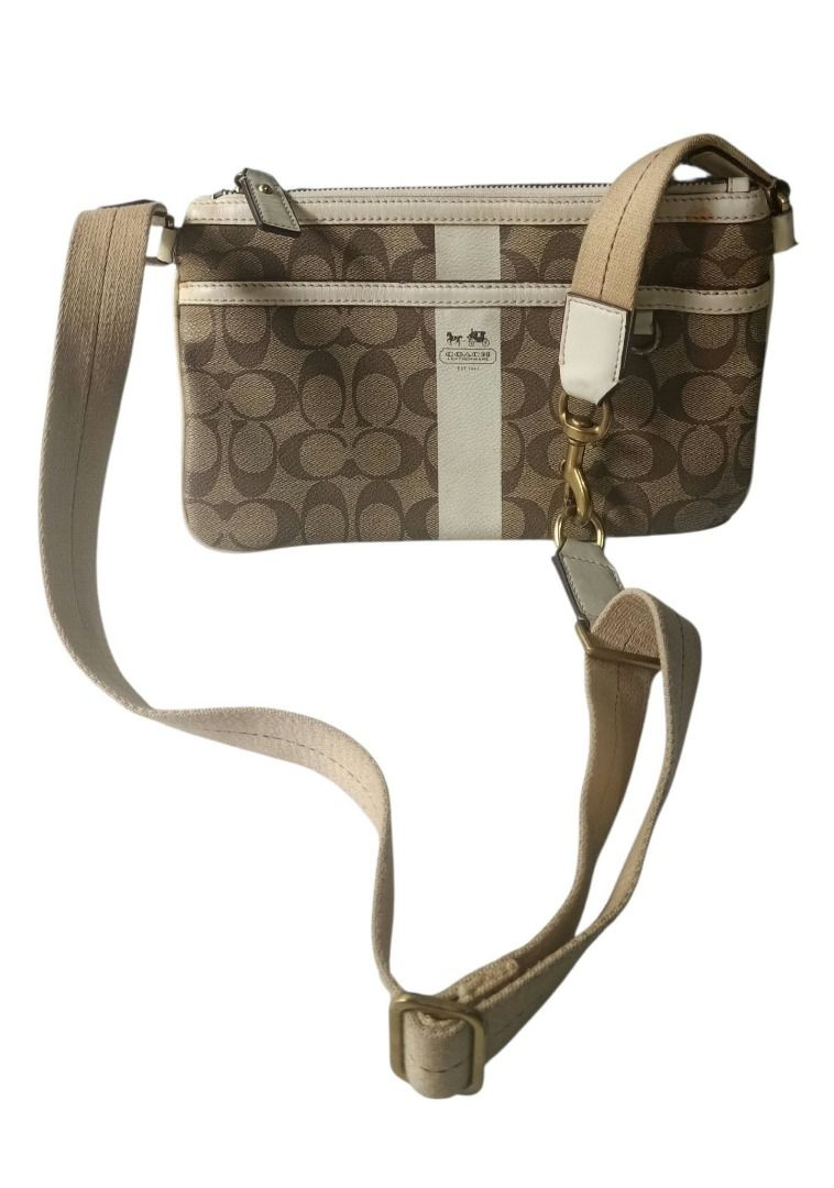 ⚜️Coach Heritage Demi Shoulder Bag (Category: Luxury Bags & Wallets) located in Manila. Submitted by 74_tiger (Listing ID 1470909938, Image 2). Description: Item: Coach Heritage Demi Shoulder Bag Condition: Like New Material: Mixed 💯% Authentic Rare Finds Vintage Piece Unique Style Hard To Find These Days White Leather Trim Detachable Sturdy Strap Brass Gold Hardwares Clean Inner Linings Sign of Usage Very Presentable Last Photo For The Flaws Ca