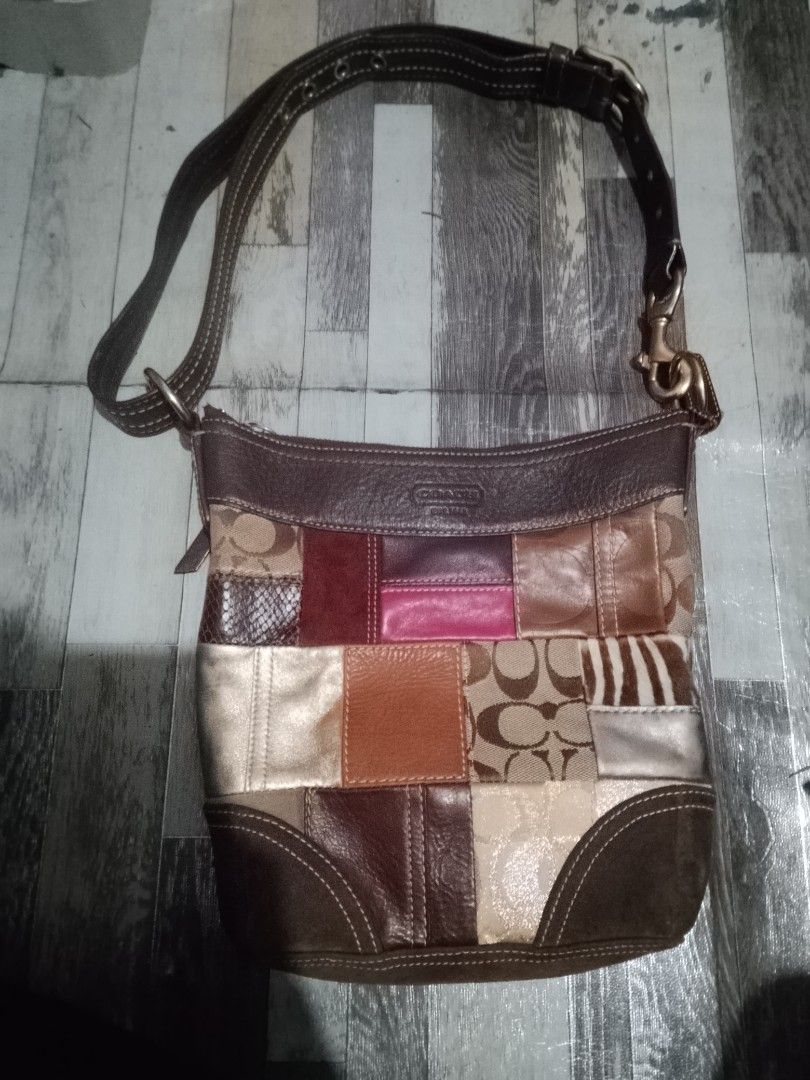 Coach Patchwork Signature Crossbody Bag Brown Multi (Category: Luxury Bags & Wallets) located in Quezon City. Submitted by theoneshop1 (Listing ID 1470854004, Image 1). Description: - Authentic Coach crossbody bag in a unique multi-material patchwork design - Features a stylish mix of suede, metallic leather, signature canvas, and animal print patches - Accentuated with premium brown leather trim and durable brass hardware - Secure zipper closure