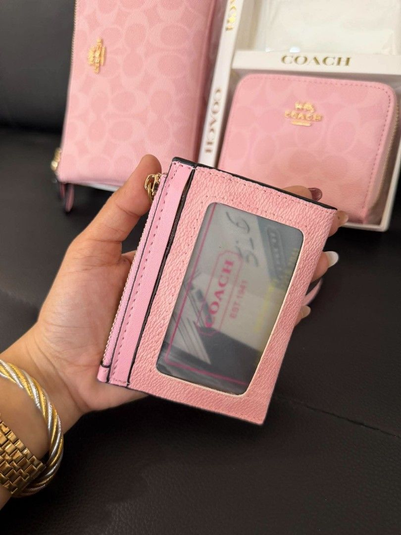 Coach pink 3in1 (Category: Wallets & Card holders) located in Manila. Submitted by wearforce (Listing ID 1470757505, Image 2). Description: Coach pink 3in1 1 Card Wallet 1 Mini Wallet 1 Wristlet (can also be used as a sling bag!) comes in a cute gift box too! 🎁 1,950 + sf.