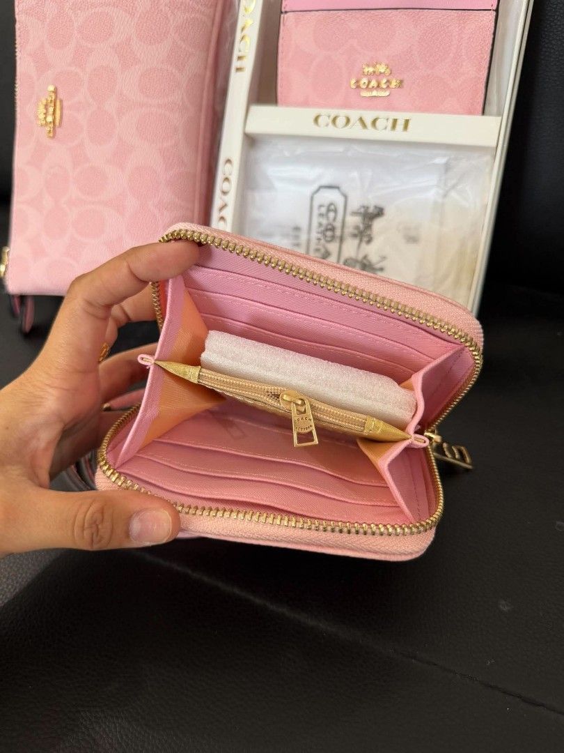 Coach pink 3in1 (Category: Wallets & Card holders) located in Manila. Submitted by wearforce (Listing ID 1470757505, Image 3). Description: Coach pink 3in1 1 Card Wallet 1 Mini Wallet 1 Wristlet (can also be used as a sling bag!) comes in a cute gift box too! 🎁 1,950 + sf.